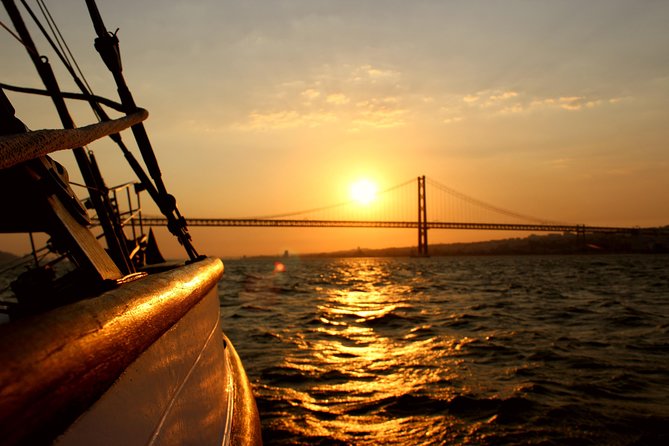 Lisbon: Daylight or Sunset on a Vintage Sailboat - Lisbon at Sunset From the Tagus, With a Vintage Sailboat Mood