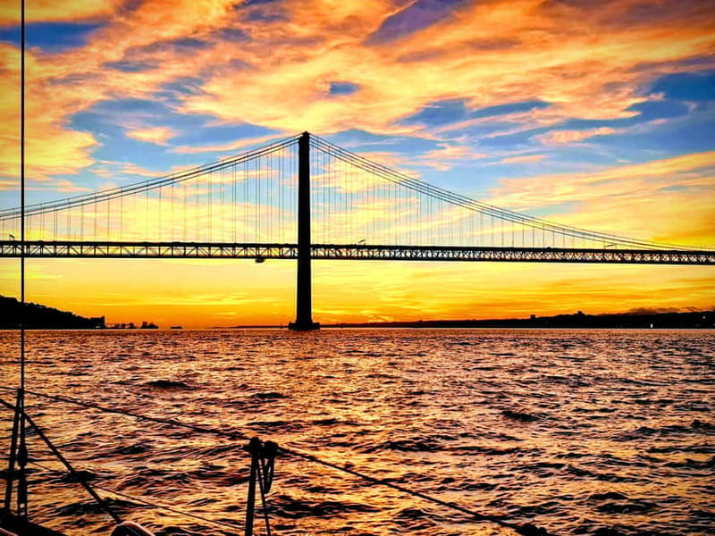 Lisbon: Daytime or Sunset Boat Cruise with History and Wine - Who should book the Lisbon sunset sailing cruise, and who might skip it