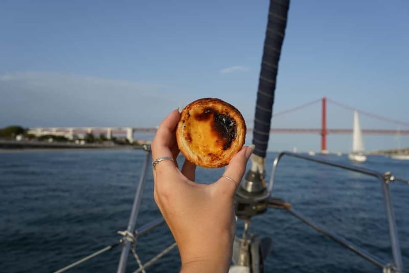 Lisbon: Daytime or Sunset Boat Cruise with History and Wine - Alfama and the riverfront sweep past Praça do Comércio, the “magic hour” section