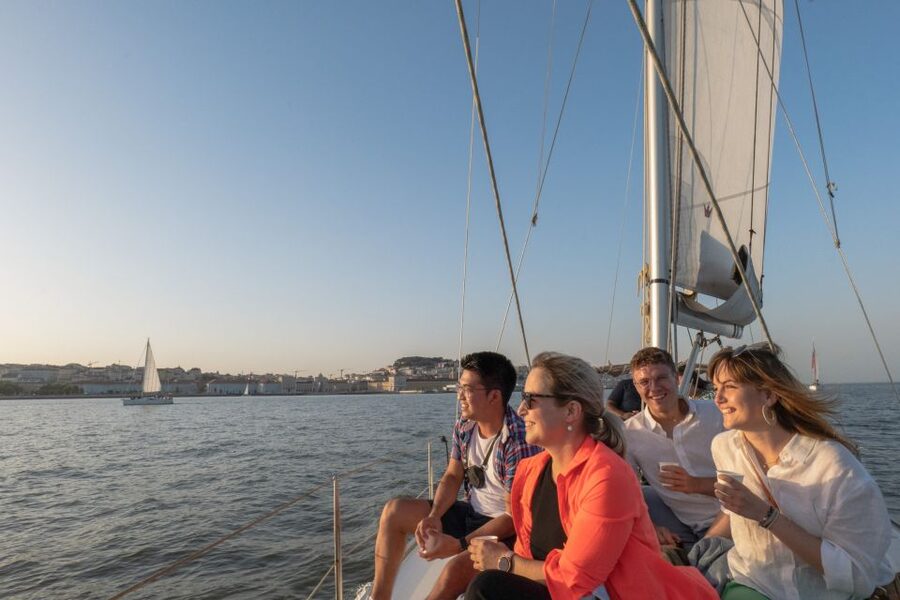 Lisbon: Daytime/Sunset/Night City Sailboat Tour with Drink - Under the 25 de Abril Bridge, plus MAAT, Ajuda, and Cais-adjacent views