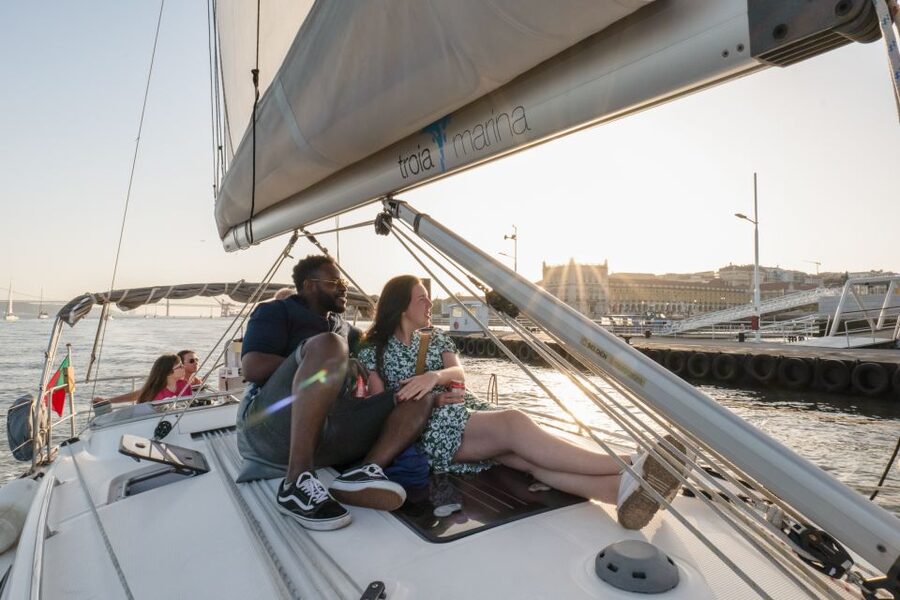 Lisbon: Daytime/Sunset/Night City Sailboat Tour with Drink - Commerce Square and São Jorge Castle from the waterline