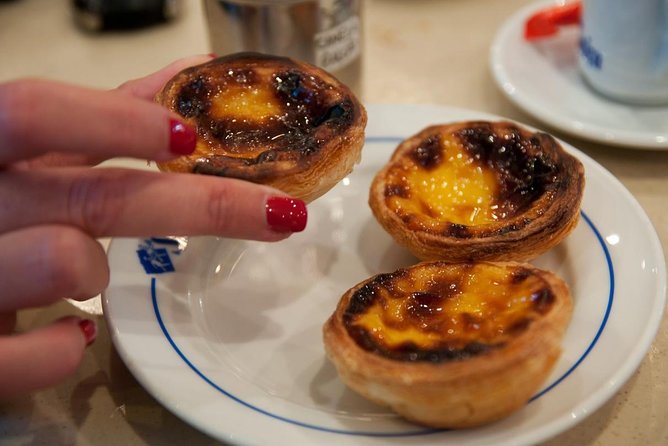 Lisbon E-Bike Guided Food Tour with Five Food Tastings - Stop 1, Praça do Comércio: Lisbon’s Rebuilding Moment