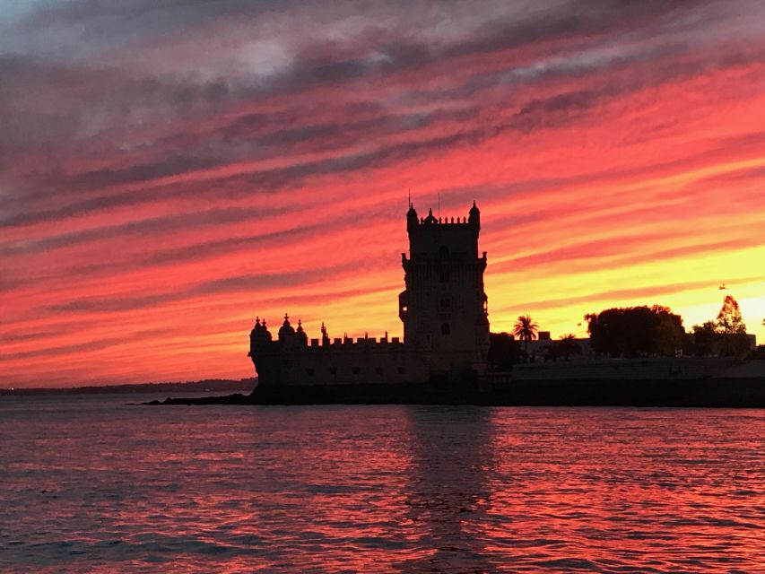 Lisbon: Enjoy a Sunset or Night Tagus River Sailboat Cruise - South bank views: old forts and prisons, plus the 25 April Bridge