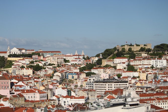 Lisbon Essential Walking Tour: History, Stories and Lifestyle - Baixa coffee and pastry, then Praca da Figueira plus a tram ride
