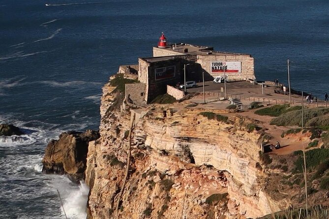 Lisbon: Fátima, Nazaré and Óbidos Full-Day Guided Tour - Praia do Norte: giant-wave reputation, canyon geology, and big-view walking