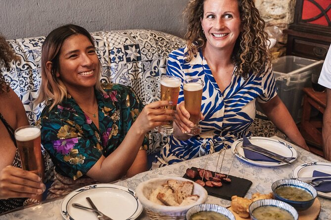 Lisbon Flavours: Baixa Guided Food Tour with Portuguese Wine - Rua da Madalena street food: bifana, beer, and crispy comfort bites
