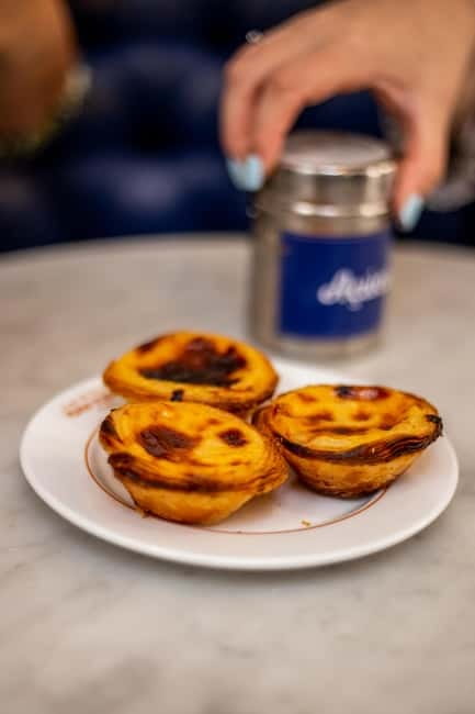 Lisbon: Food Tasting Tour by Tuk Tuk with 2 Stops - Food and wine tasting expectations: small portions, big variety
