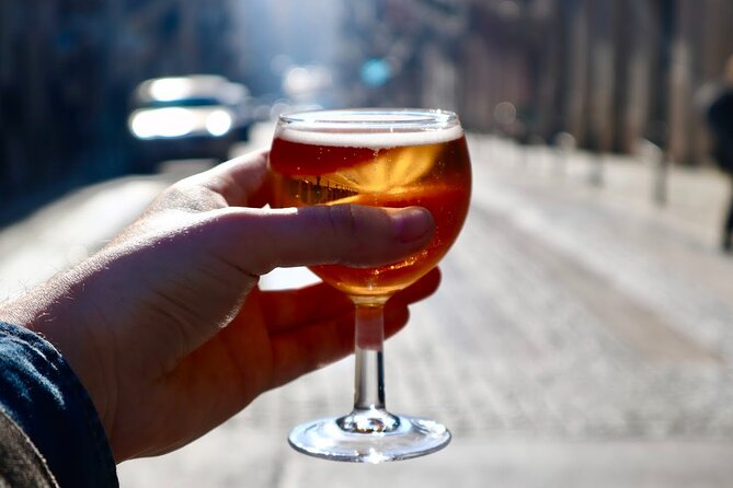 Lisbon Food Tour with 10+ Tastings of Local Delicacies & Wines - Wine, ginjinha, and drinks that shape the experience