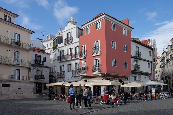 Lisbon Food Tour with 3 Stops and Fado Show Performance - Stop 2 in Alfama: Mercearia petiscos with cheese, cold cuts, and Portuguese wine