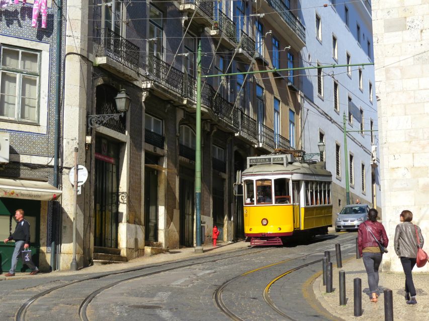 Lisbon: Full-Day Small-Group City Tour with Hotel Pickup - Comfort and Guide Style: From Audi A3 Rides to WhatsApp Contacts