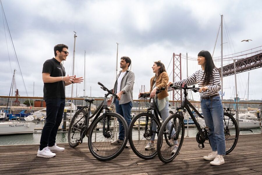 Lisbon: Guided Bike Tour, Helicopter Flight, and Boat Trip - Belém boat cruise: relax with Tagus views and the 25 de Abril Bridge