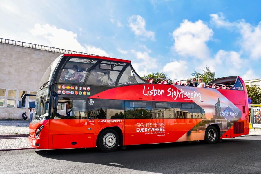 Lisbon: Hop-On Hop-Off Bus Tour - Uptown (Purple) Line for modern Lisbon, shopping, and Zoo-friendly stops