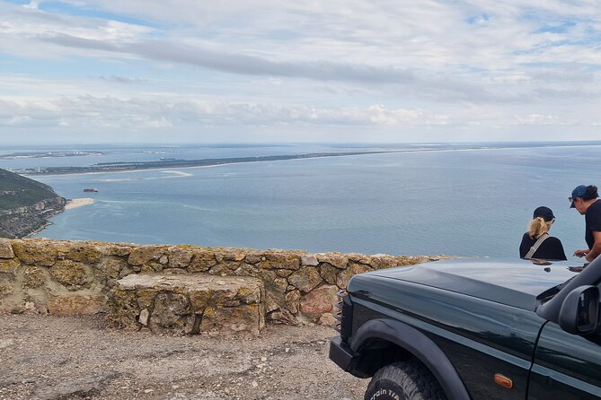 Lisbon: Jeep and Boat Adventure to Arrábida + Hotel Pick-Up - Door-to-door pickup with a name sign and a tight group