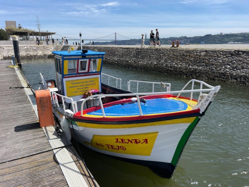 Lisbon: Live Guided Traditional Boat Sightseeing Cruise Tour - What comfort looks like on a windy Tagus day