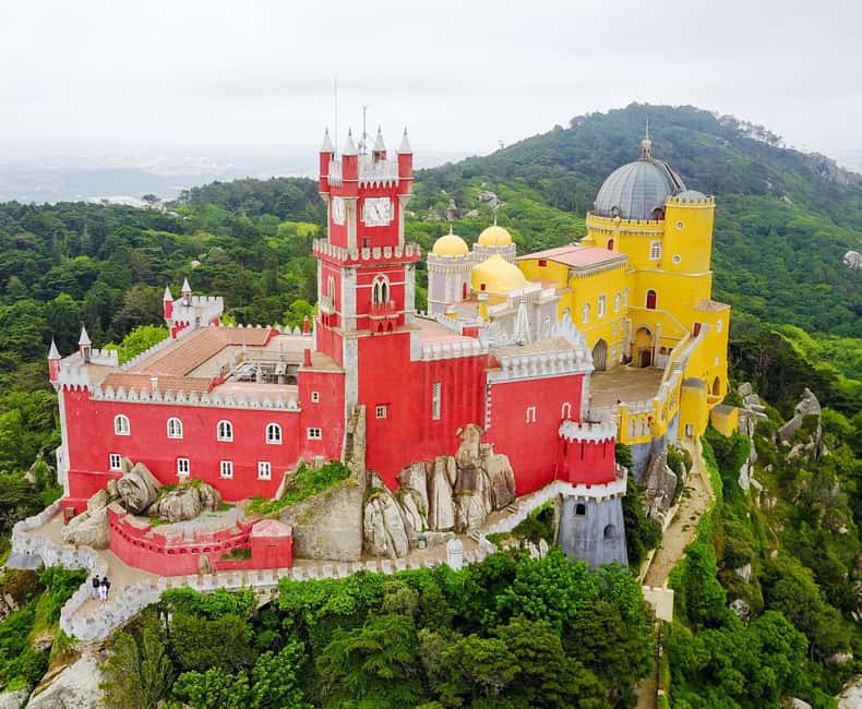 Lisbon: Pena Palace, Sintra, Roca & Cascais by Van - Sintra village stop plus optional monuments like Quinta da Regaleira