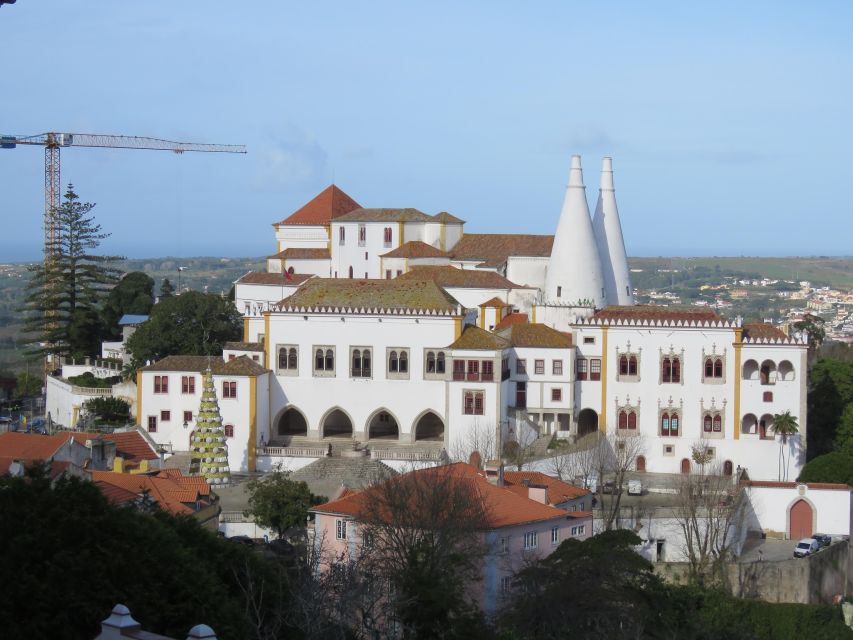 Lisbon: Pena, Regaleira & Atlantic Coast Tour with a Local - Quinta da Regaleira: tunnels, symbols, and the Initiation Well