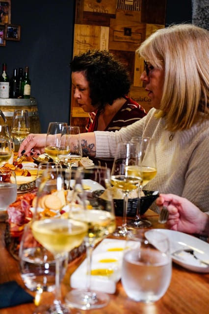Lisbon: Premium Wine and Tapas Tasting Session - The food side is the main character: cheeses, sausages, and boards