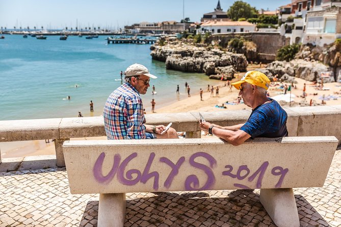 Lisbon Private Custom Tour with a Local, Highlights & Hidden Gems - Cobbled streets, murals, music, and dusk plans