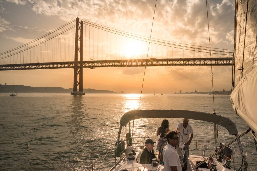 Lisbon: Private Sunset Cruise on the Tagus River with Drink - Crew Energy, Live Commentary, and That Small-Touch Service
