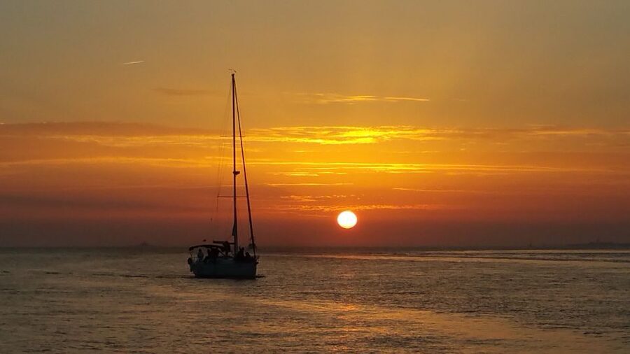 Lisbon: Private Sunset Cruise with Portuguese Wine - Under the 25 de Abril Bridge, the cruise turns into pure sightseeing