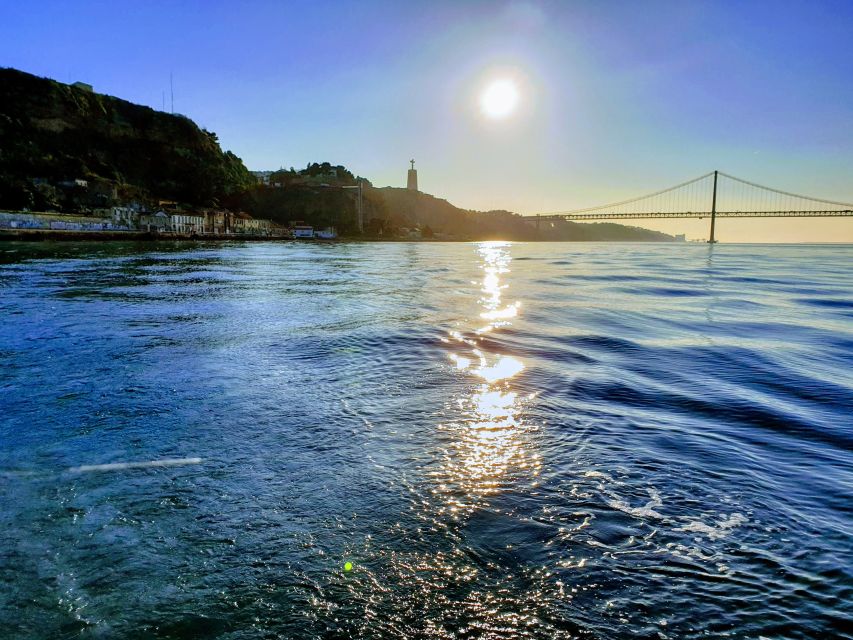 Lisbon: Private Sunset Cruise with Portuguese Wine - Alfama, Castle Quarter, and the old-city look you normally only get on hills
