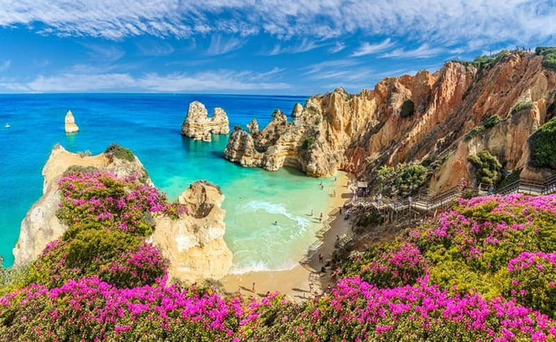Lisbon: Private Tour Benagil, Algar Seco, Portimao & Lagos - Ponta da Piedade and Praia do Camilo: golden cliffs and the staircase-to-sand moment