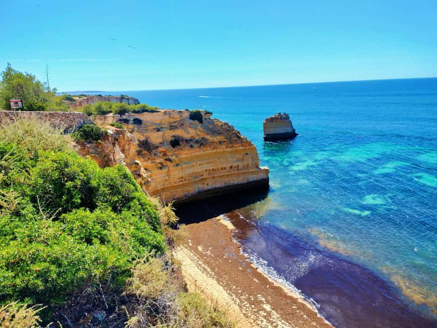 Lisbon: Private Tour to Algarve, Algar Seco, Benagil & Lagos - Ponta da Piedade: golden cliffs, arches, and fast photo angles