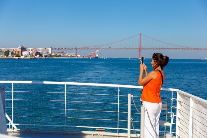 Lisbon River Boat Sightseeing Tour with a Drink - Christ the King at Almada: a giant cross facing Lisbon