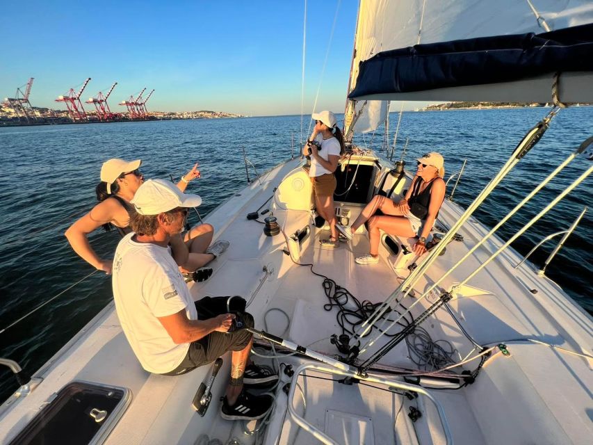 Lisbon: Sailing Sunset - 25 de Abril, Cacilhas, Cristo Rei, and distant hill views