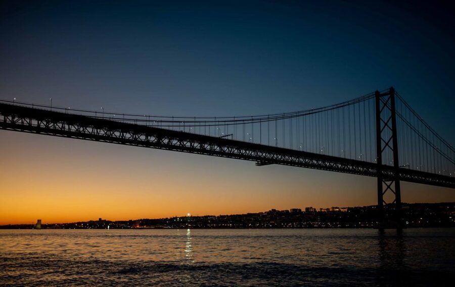 Lisbon: Scenic Day & Sunset Boat Tour with a Drink - The solidarity twist that changes how you experience the boat ride