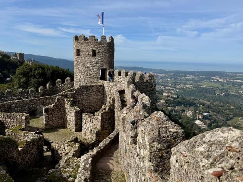 Lisbon: Sintra, Pena Palace, Moorish Castle & Regaleira Tour - Monserrate Palace and the City-to-Coast Switch