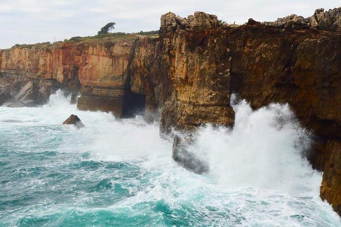 Lisbon: Sintra, Pena Palace, Regaleira, Roca & Cascais Day Tour - Cabo da Roca, Guincho Road, and the west-coast photo run