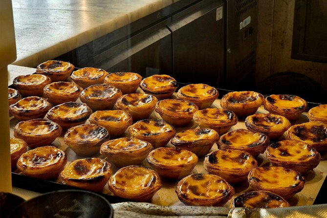 Lisbon Small-Group Food Tour: Eat & Drink Like a Local - Chouriço assado and red wine: smoky flavors and a classic pairing