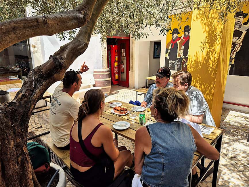 Lisbon Small-Group Food & Wine Tour Eat & Drink like a Local - Dessert finish: pastel de nata with Port wine