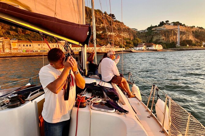 Lisbon Small Group Sunset Sailing 2h Cruise with Drinks Included - Two major bridges, plus the fun of seeing engineering from a moving boat