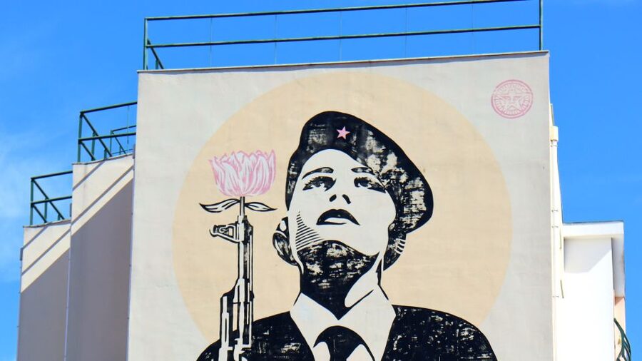Lisbon: Street Art and Historical Walking Tour - Street art stops in Graça and Mouraria, and how to read the walls