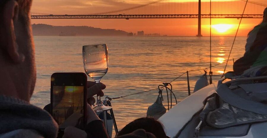 Lisbon: Sunset and Wine Luxury Catamaran Cruise - Waterfront sights along the Tagus, from palaces to warehouses