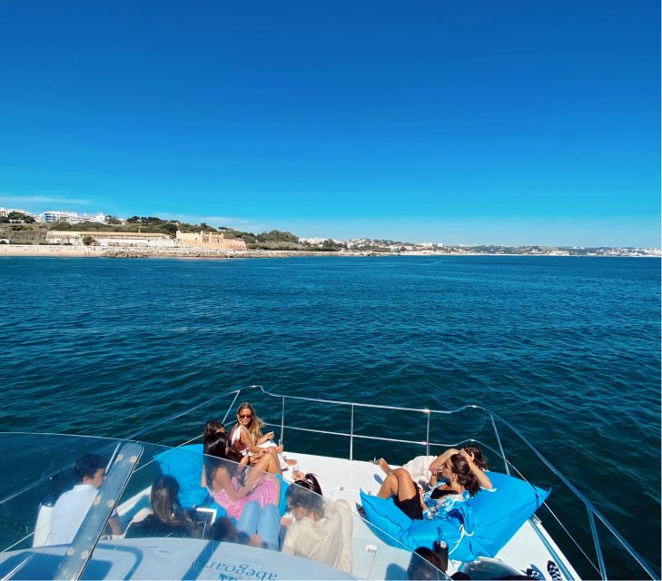 Lisbon: Sunset Boat Tour with Wine - Photo stop at 25 de Abril Bridge, then Commerce Square and Alfama