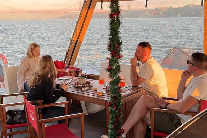Lisbon : Sunset Catamaran Boat Tour with Music and Drinks - The science stop, then Belem’s defense tower and Discoveries-era architecture