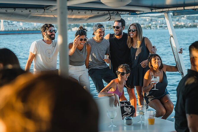 Lisbon : Sunset Catamaran Boat Tour with Music and Drinks - Music-forward cruising: fun for some, wrong fit for others