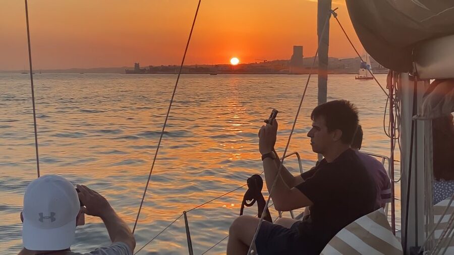 Lisbon: Sunset Cruise with Drinks - Drinks, Mixed Nuts, and the Relaxed Crew Vibe
