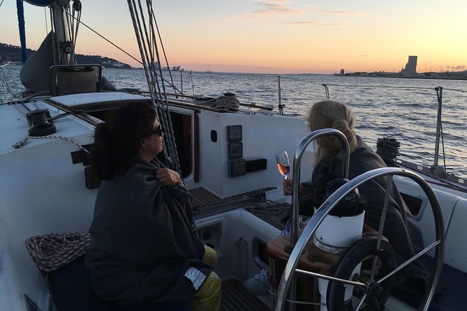 Lisbon Sunset Sailing Tour with White or Rosé Wine and Snacks - Wine and Snacks: Included, but Watch the Fine Print in Real Life