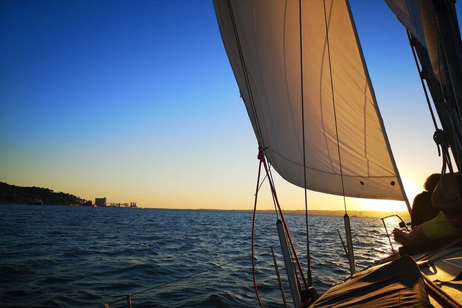 Lisbon: Sunset Sailing with Portuguese Wine and History - Wine, warmth, and the crew’s style: what makes the experience feel human