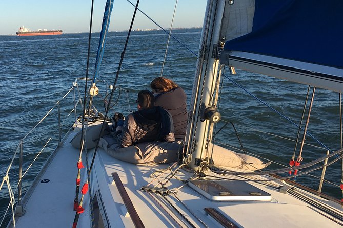 Lisbon Sunset Sensations on a Private Sailing Boat with wine&snacks - Wine, snacks, and the human touch of Manuel and crew