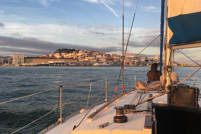 Lisbon Sunset Sensations on a Private Sailing Boat with wine&snacks - Ponte 25 de Abril to Cristo Rei: the river’s power couple