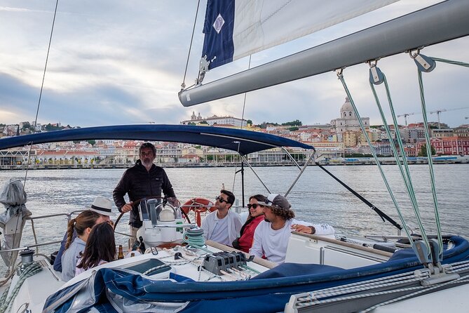 Lisbon: Sunset Tagus River Sailing Tour with Drinks - Almada views, Cacilhas Lighthouse, and why fog meant work on this river