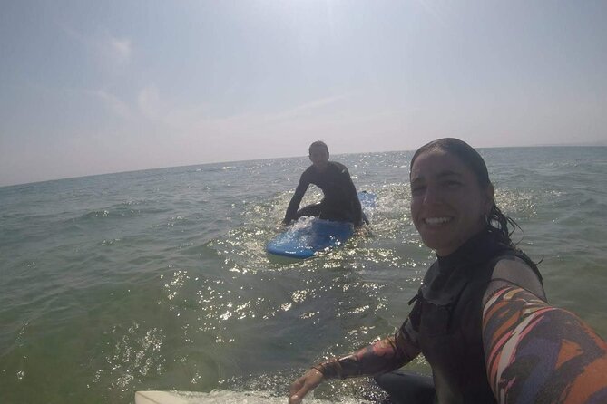 Lisbon Surf Guide - Surf class & Pick Up - Beach Arrival: Wetsuits, Safety Briefing, and the Warm Up That Prevents Panic