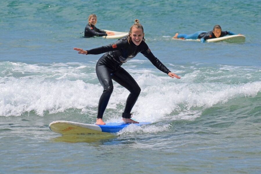 Lisbon: Surf Lesson - Where it starts: Carcavelos Beach, gear on, ready to learn