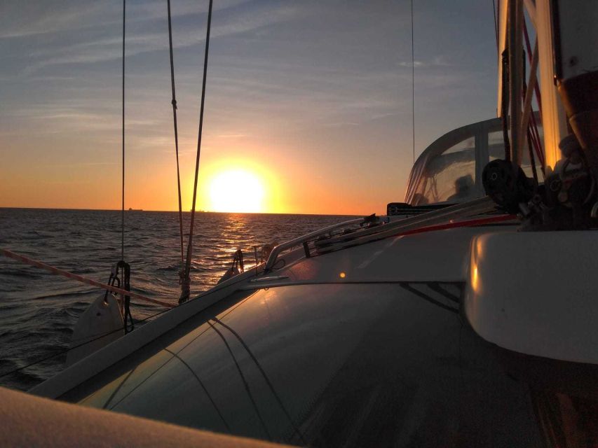 Lisbon: Tagus River Sailboat Tour - Sunset drinks, Portuguese snacks, and the blanket moment