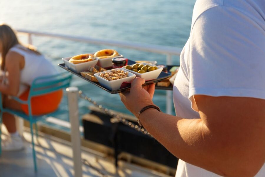 Lisbon: Tagus River Sunset Tour with Snacks and Drink - Weather reality check: why warm clothes still matter